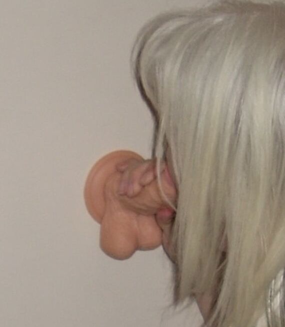 Charming mature sucking their dildo