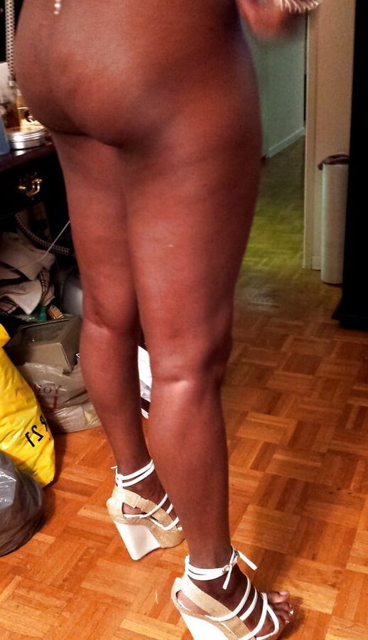 Super hot black babe in high heel boots!