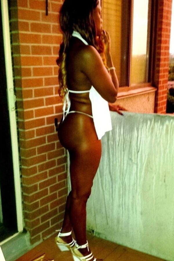 Super hot black babe in high heel boots!