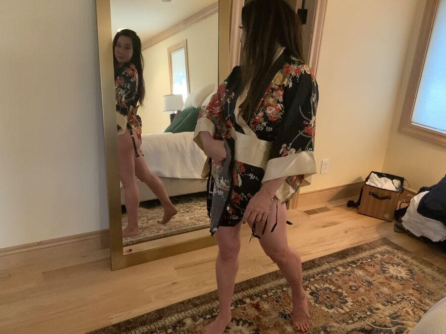 Asian MILF Playing Dress Up in Stockings