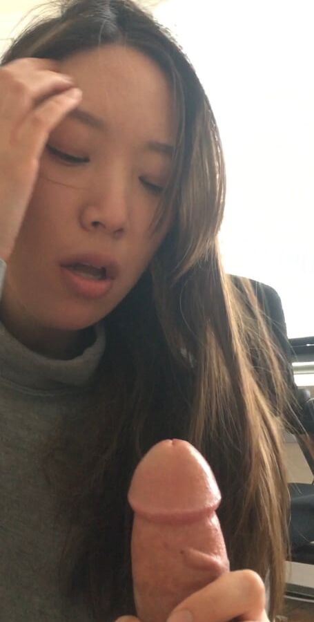Asian girl gives blowjob