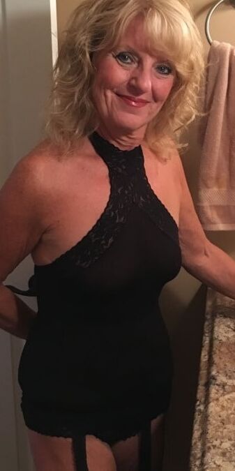 Black one-piece body suit,