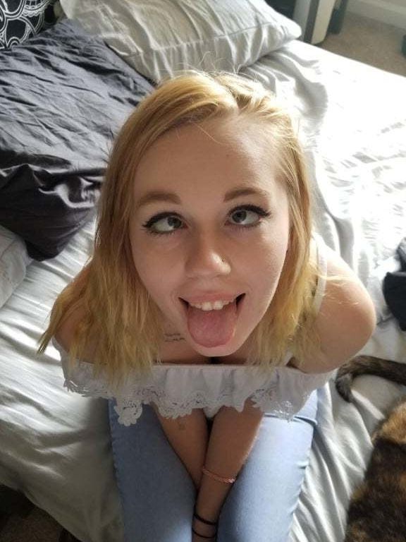 Girl takes her baby pig