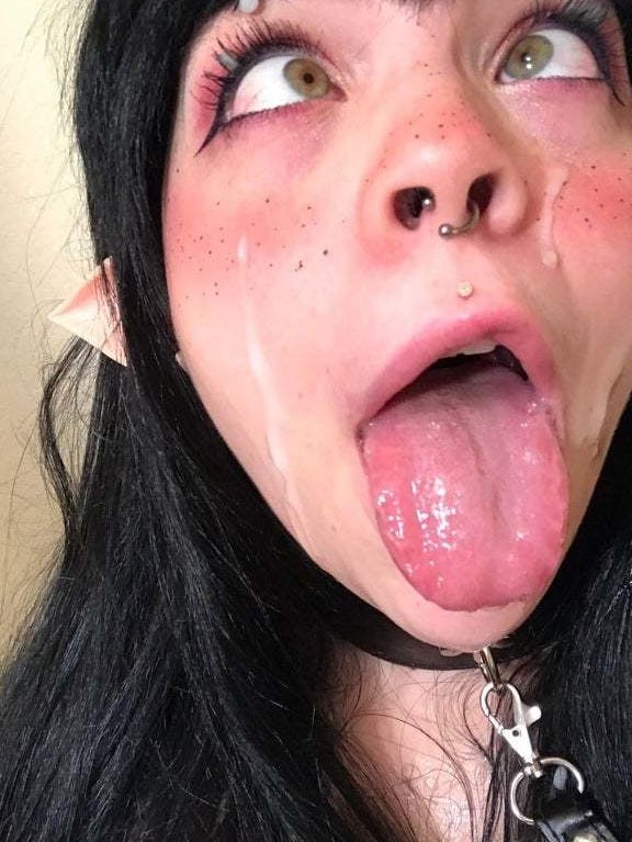 Girl takes her baby pig