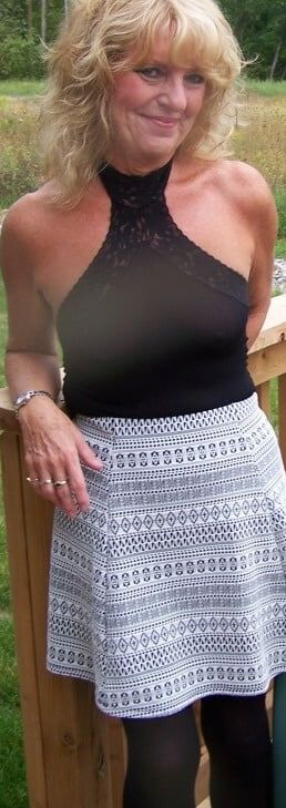 Black one-piece body suit,