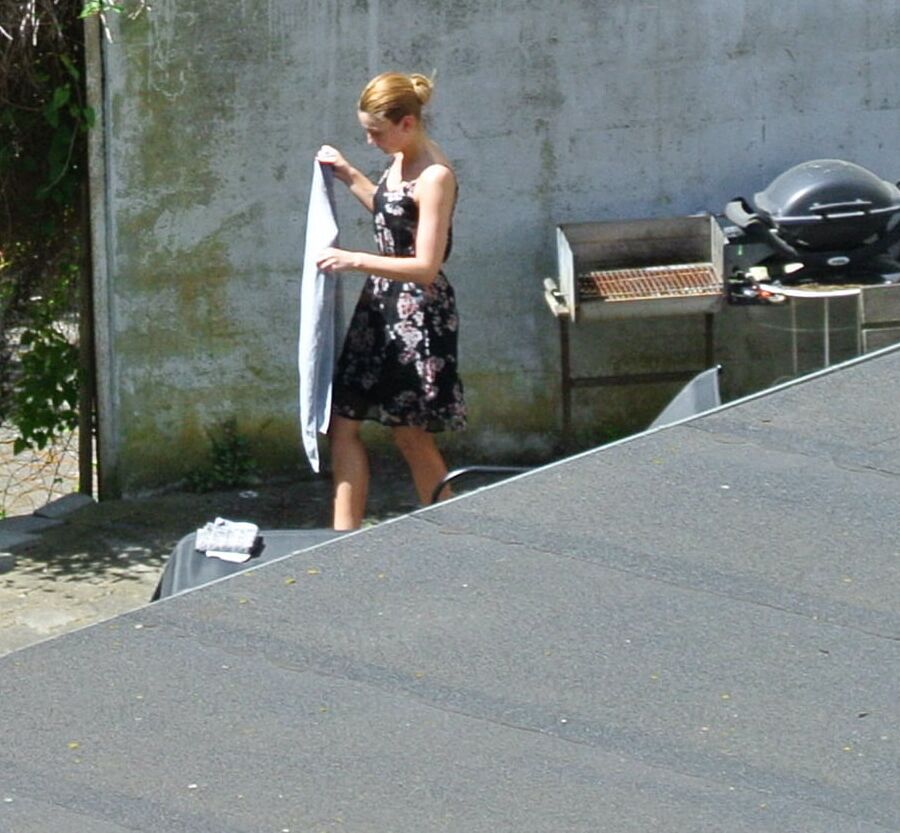 Hot girl getting taned in the yard