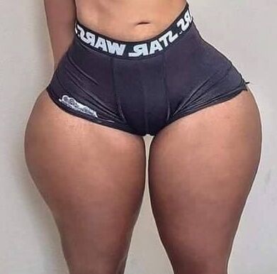 Sexy petite ebony babe with pants and no pants.