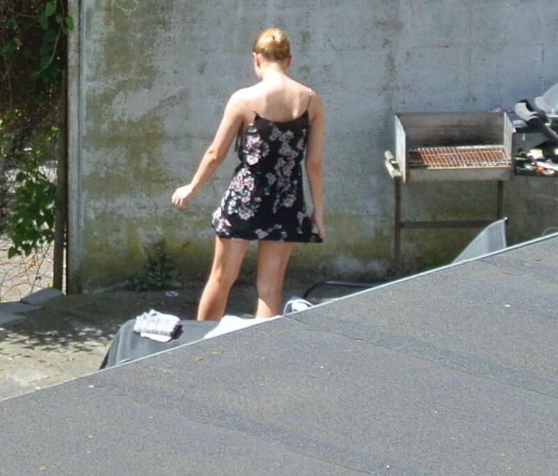 Hot girl getting taned in the yard