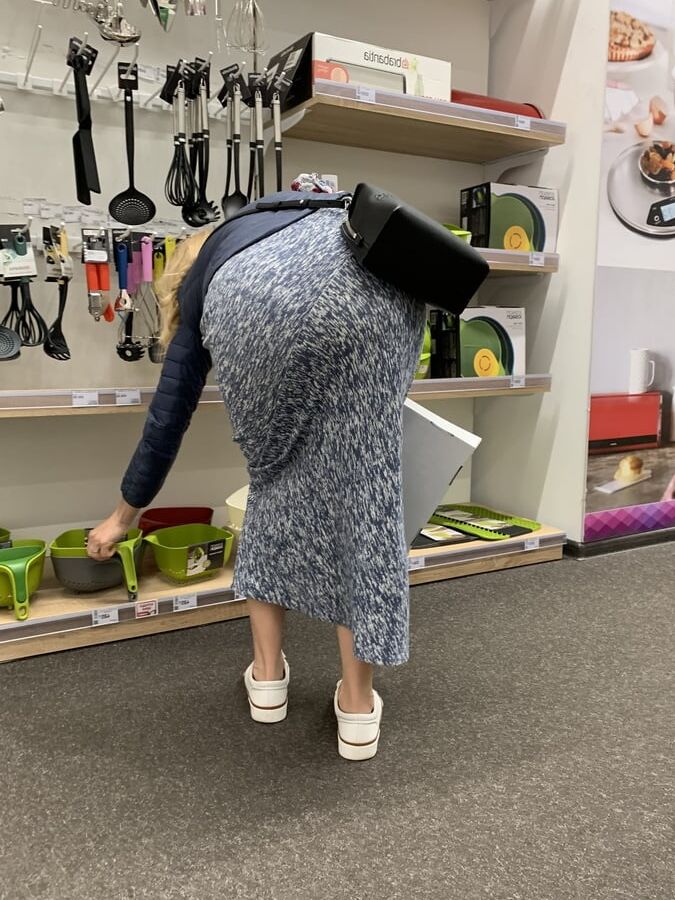 Upskirt mature in long skirt