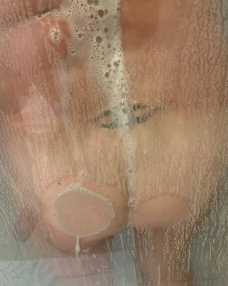 Boobs and butts against shower door