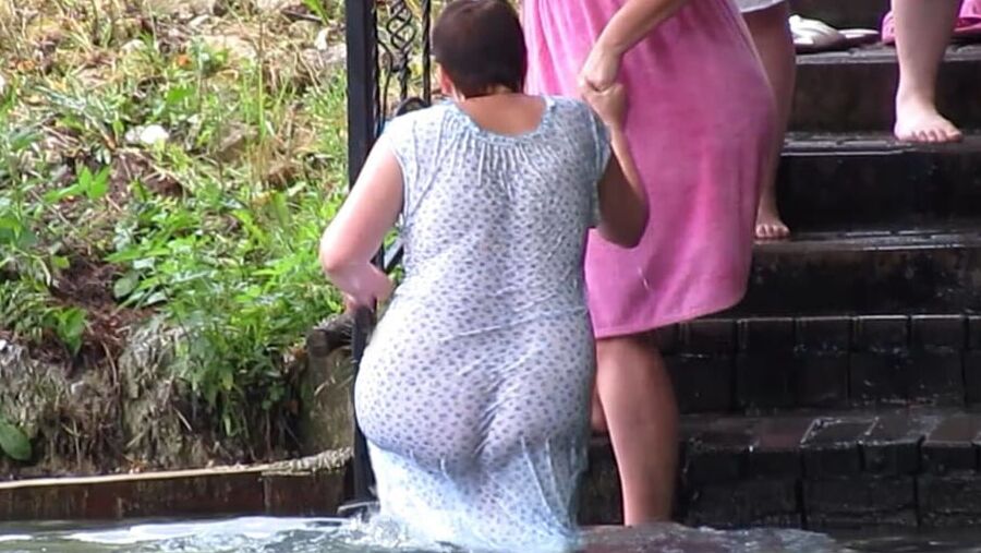 Mature Russian women bathe in cold water