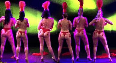 Burlesque women in red thongs