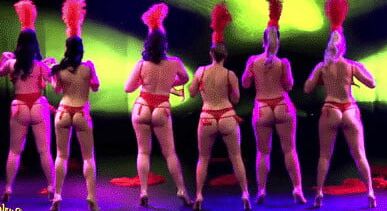 Burlesque women in red thongs