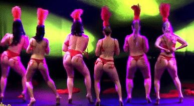 Burlesque women in red thongs