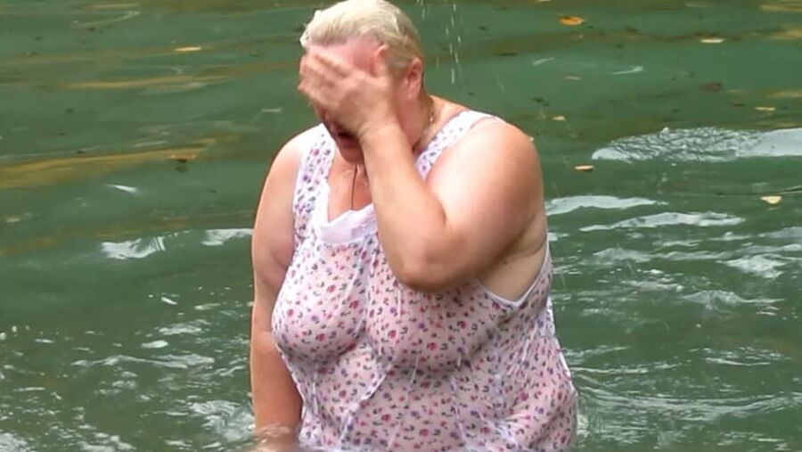 Mature Russian women bathe in cold water