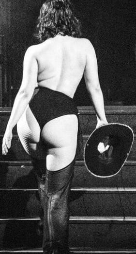Asses in see through and chaps