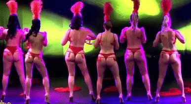 Burlesque women in red thongs