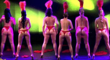 Burlesque women in red thongs