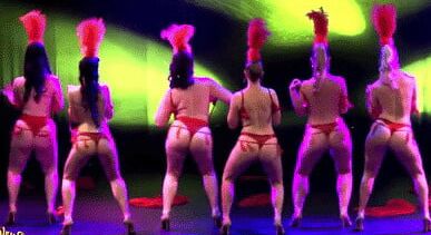 Burlesque women in red thongs