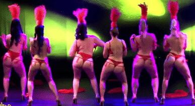 Burlesque women in red thongs