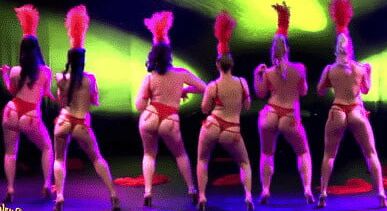 Burlesque women in red thongs