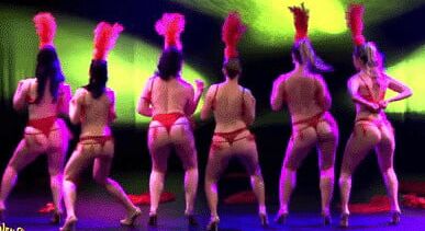 Burlesque women in red thongs