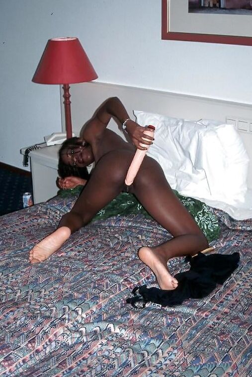 Black girl playing with dildos