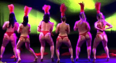 Burlesque women in red thongs