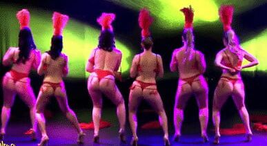 Burlesque women in red thongs