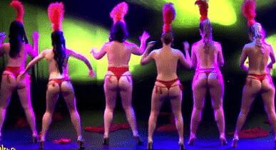 Burlesque women in red thongs