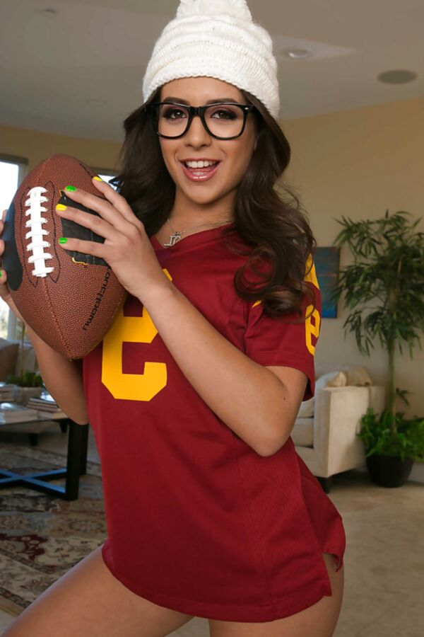 Busty babe wearing glasses