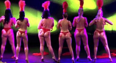 Burlesque women in red thongs