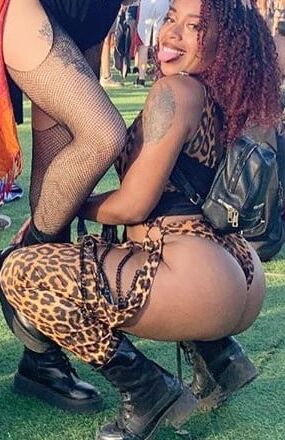 Asses in see through and chaps