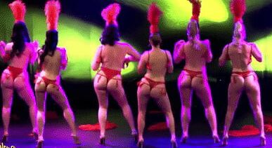 Burlesque women in red thongs