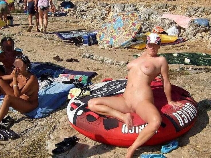 Busty slut on the beach