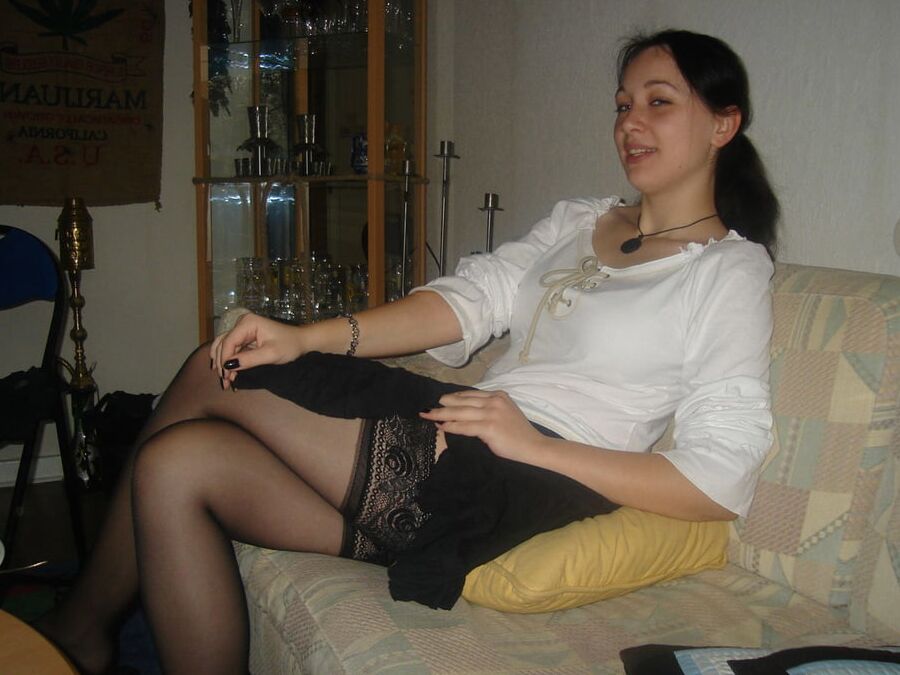 ladies lifting skirt to show her stockings