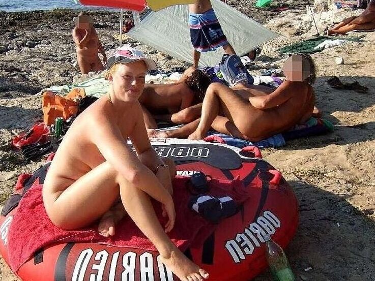 Busty slut on the beach