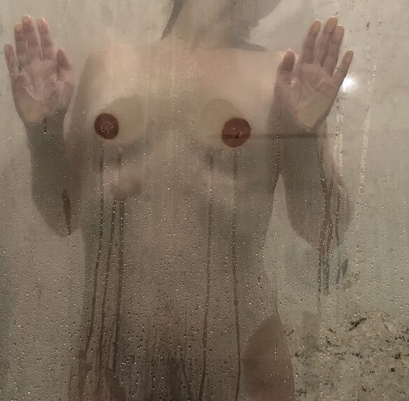 boobs against shower door