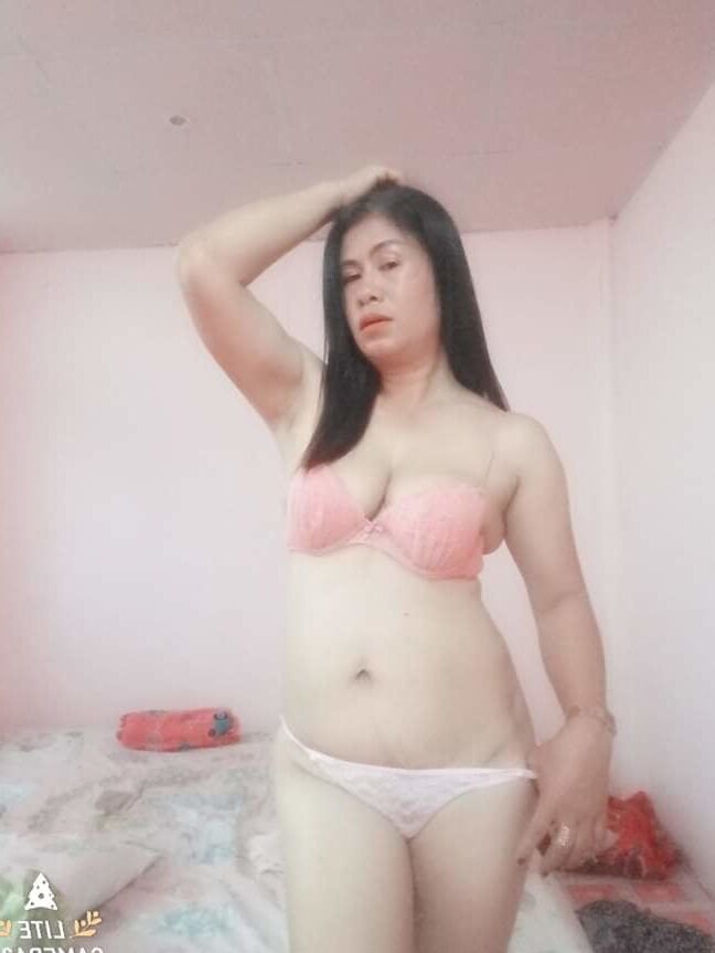 Tetek besar janda seksi