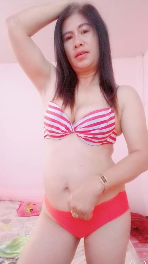 Tetek besar janda seksi