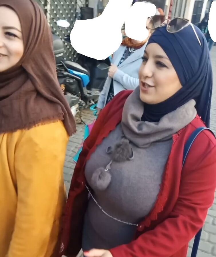 tow arabian hijab girls with huge boobs spy in street