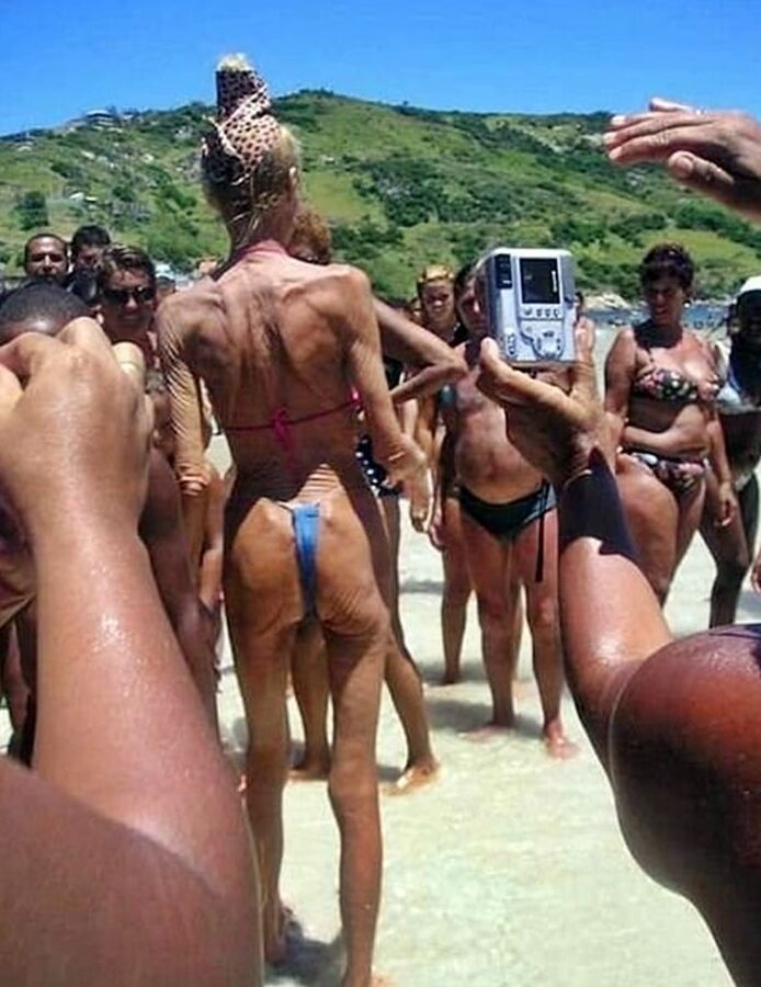 Skinny Granny On The Beach