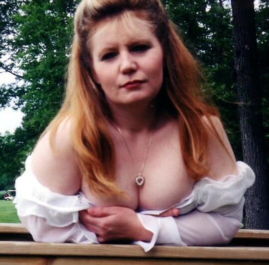 Curvy redhead amateur MILF Sandy