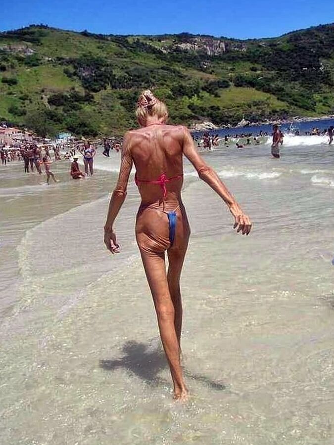 Skinny Granny On The Beach