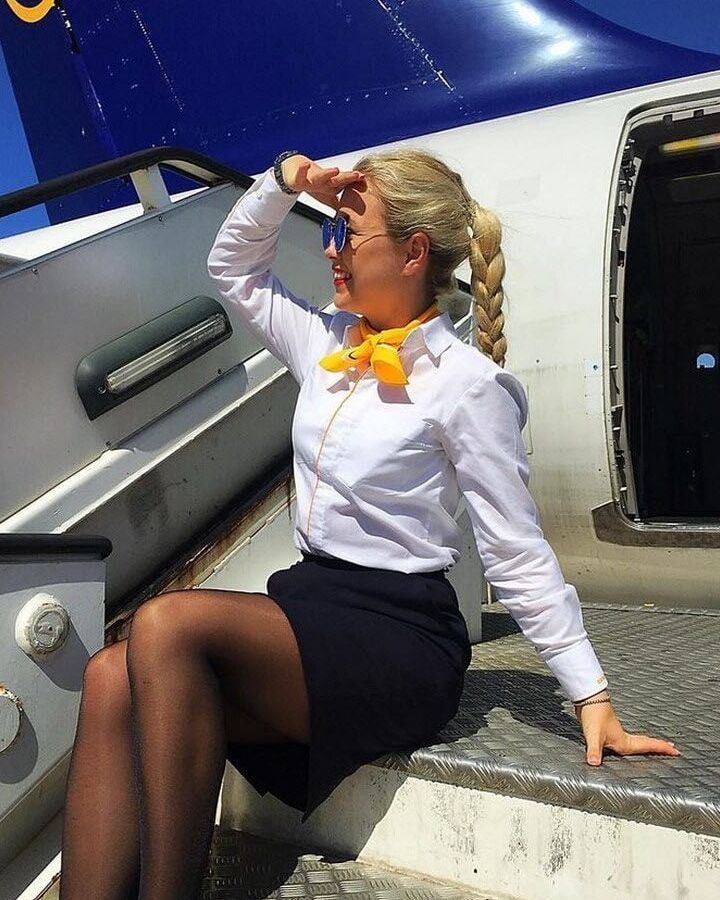 Sexy Stewardess in Heels and stockings