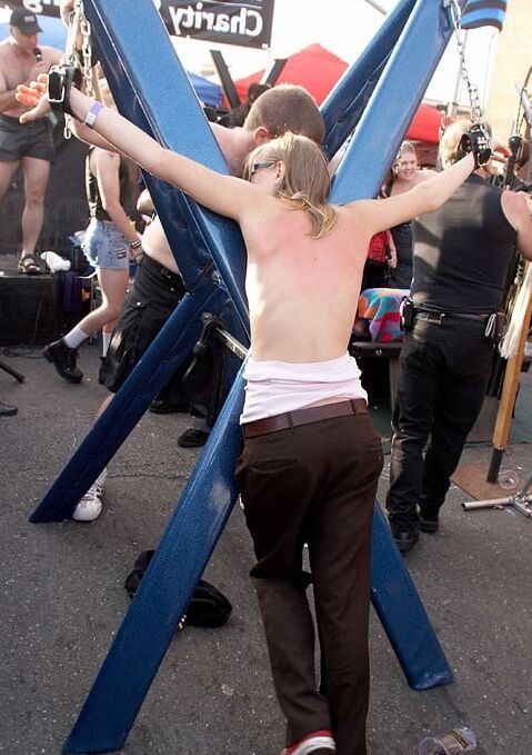 Girl getting a back flogging at Folsom Fair