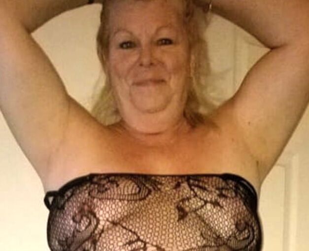 BBW granny in black posing