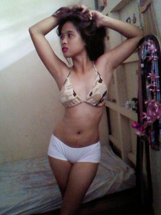 Jovencita masturbandoce