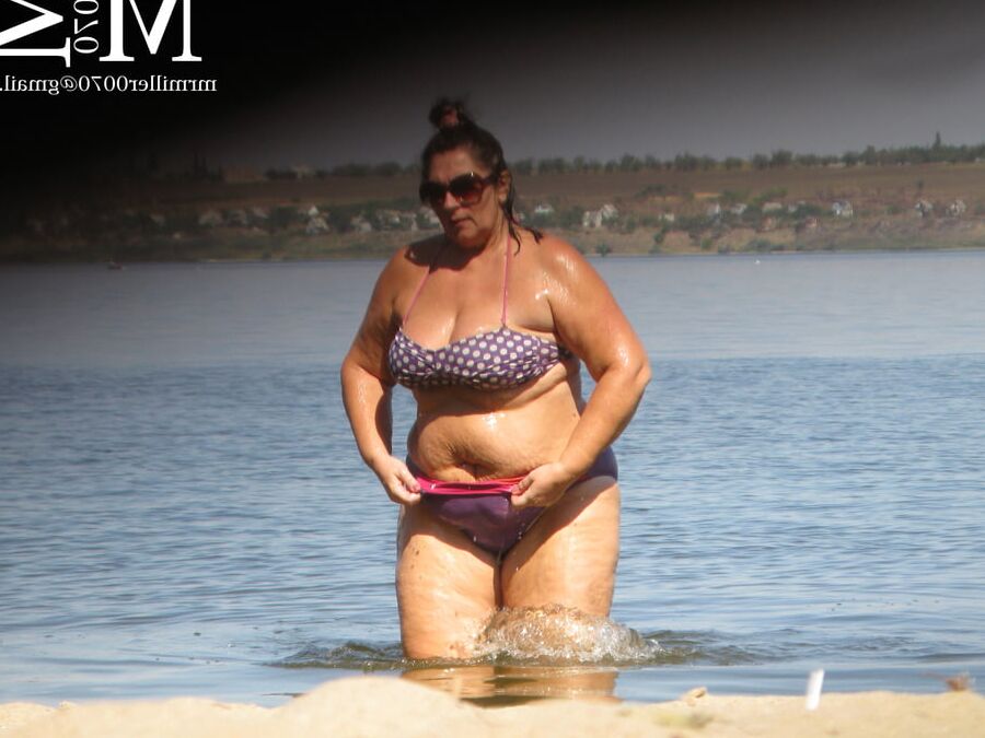 BIG ASS on the beach thongs (voyeur)
