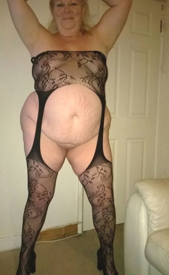 BBW granny in black posing